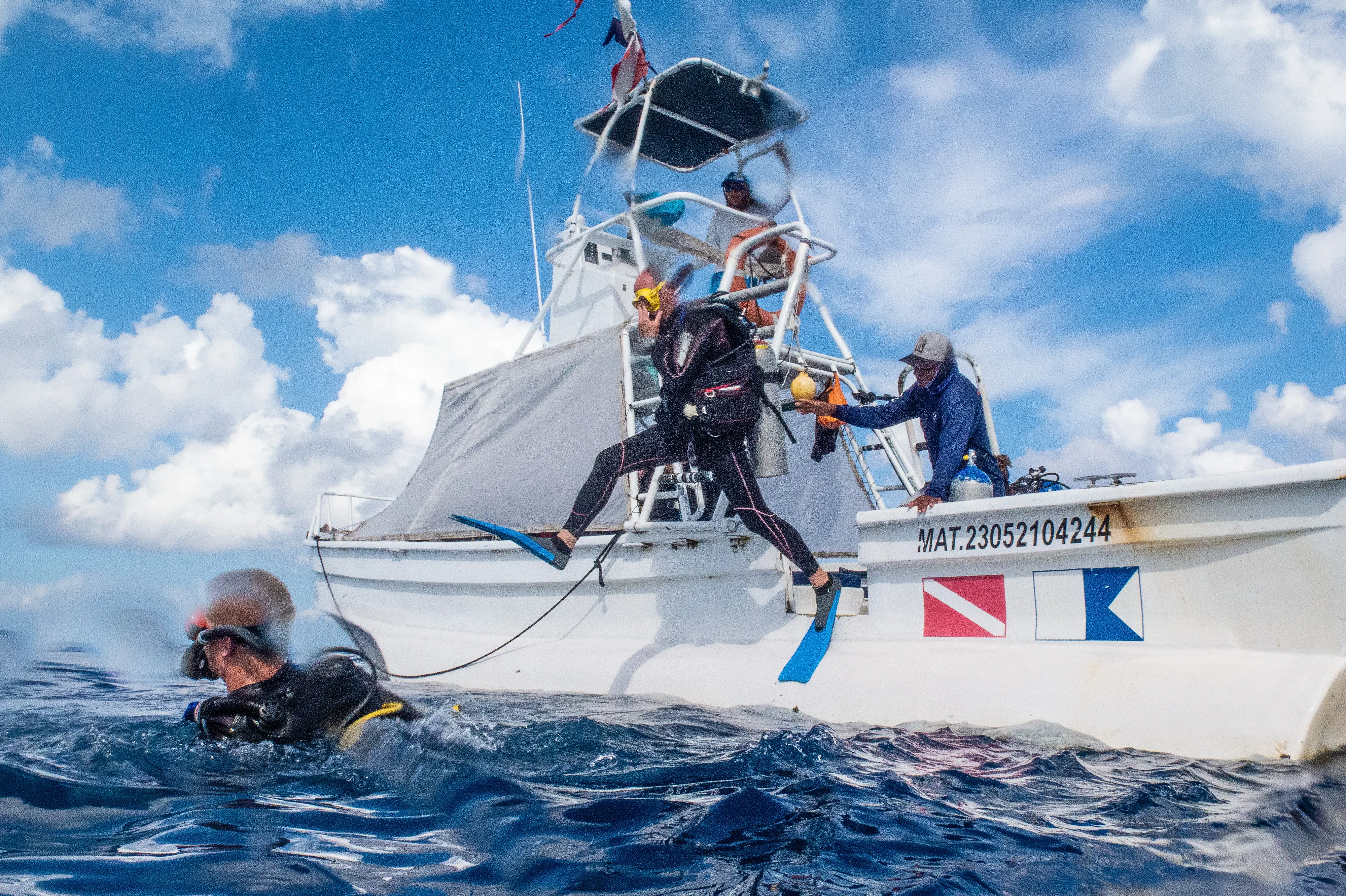Giant stride entry from scuba boat