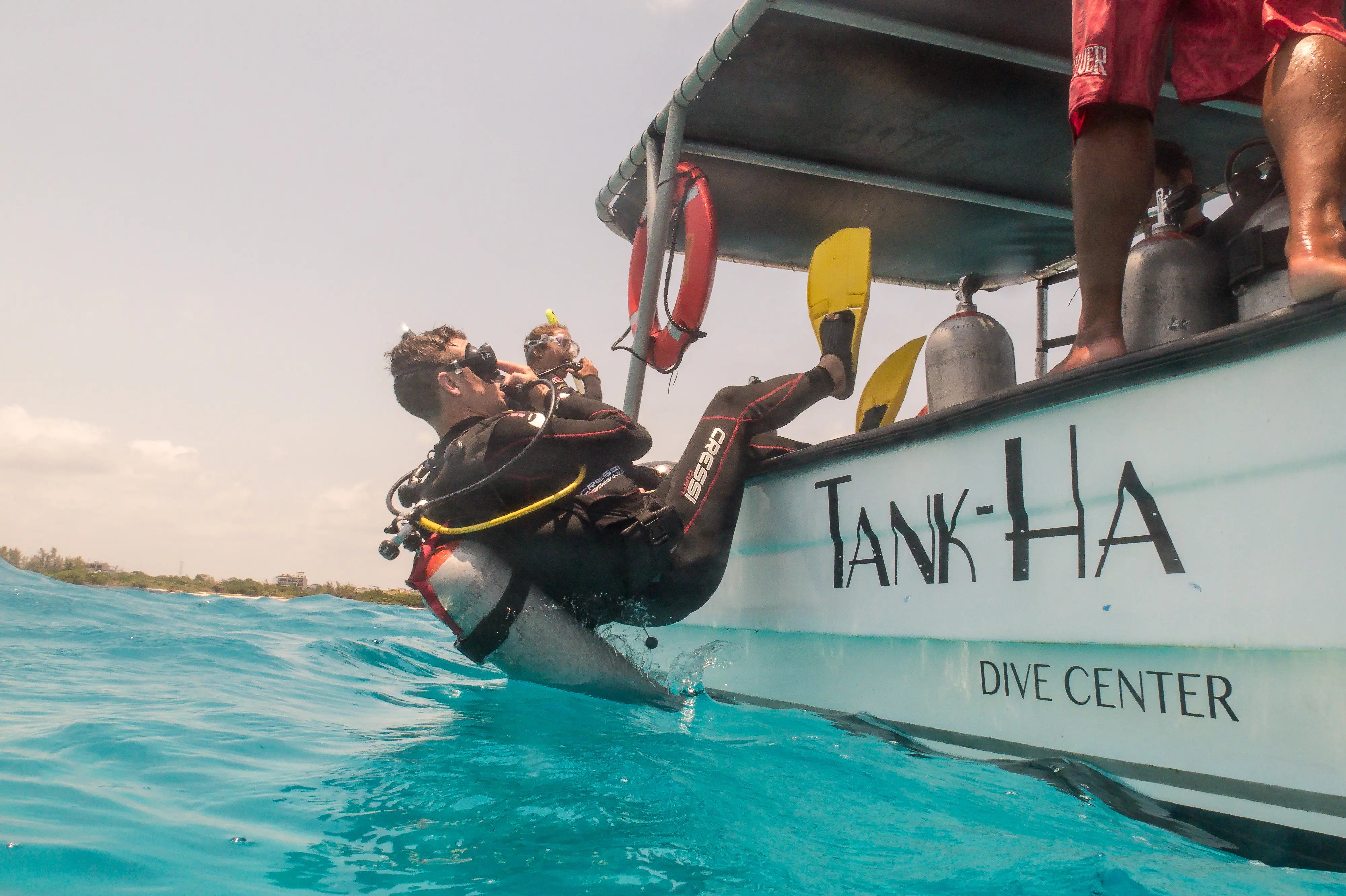Diver enters the water